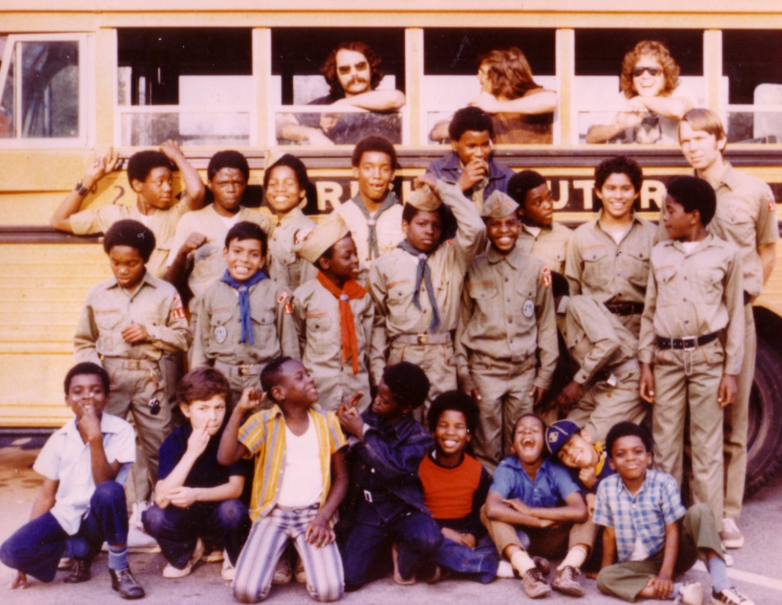 The scouts of Troop 1135 in uniform in front of the troop bus